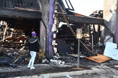 SUV crashes into Florida fireworks store, sparking huge fire