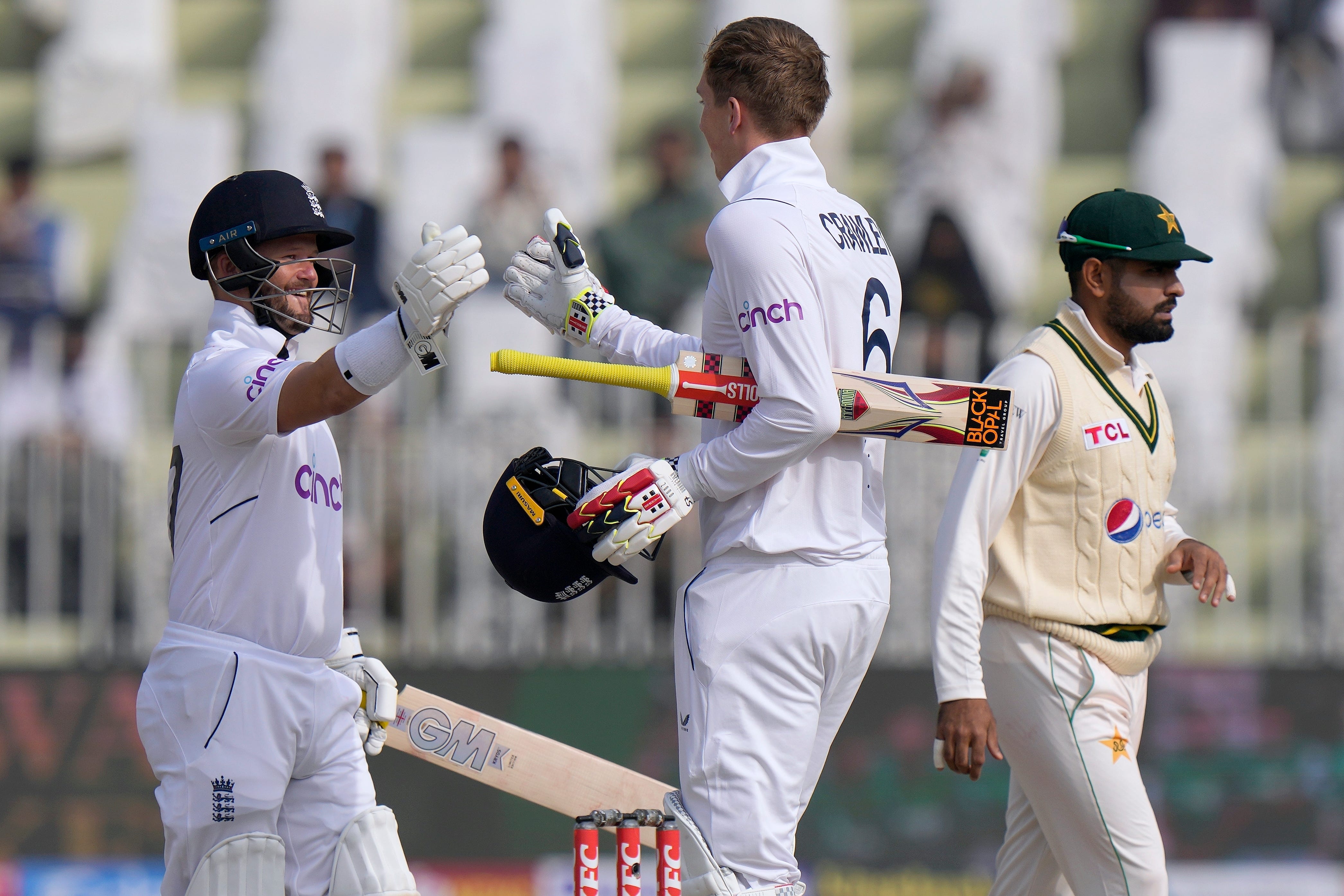 Zak Crawley and Ben Duckett both brought up centuries after lunch on day one at Rawalpindi (Anjum Naveed/AP)
