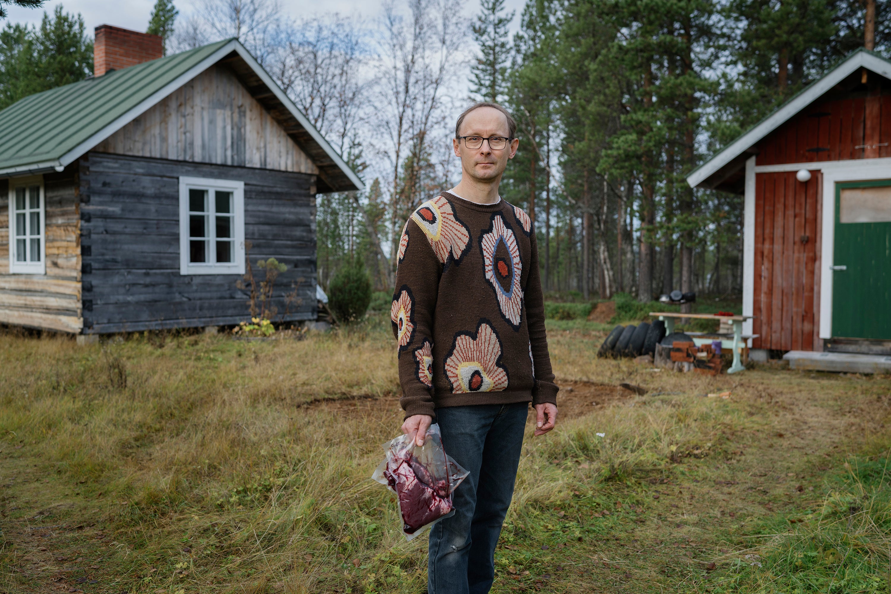 Chef Heikki Nikula preparing some reindeer heart near Inari