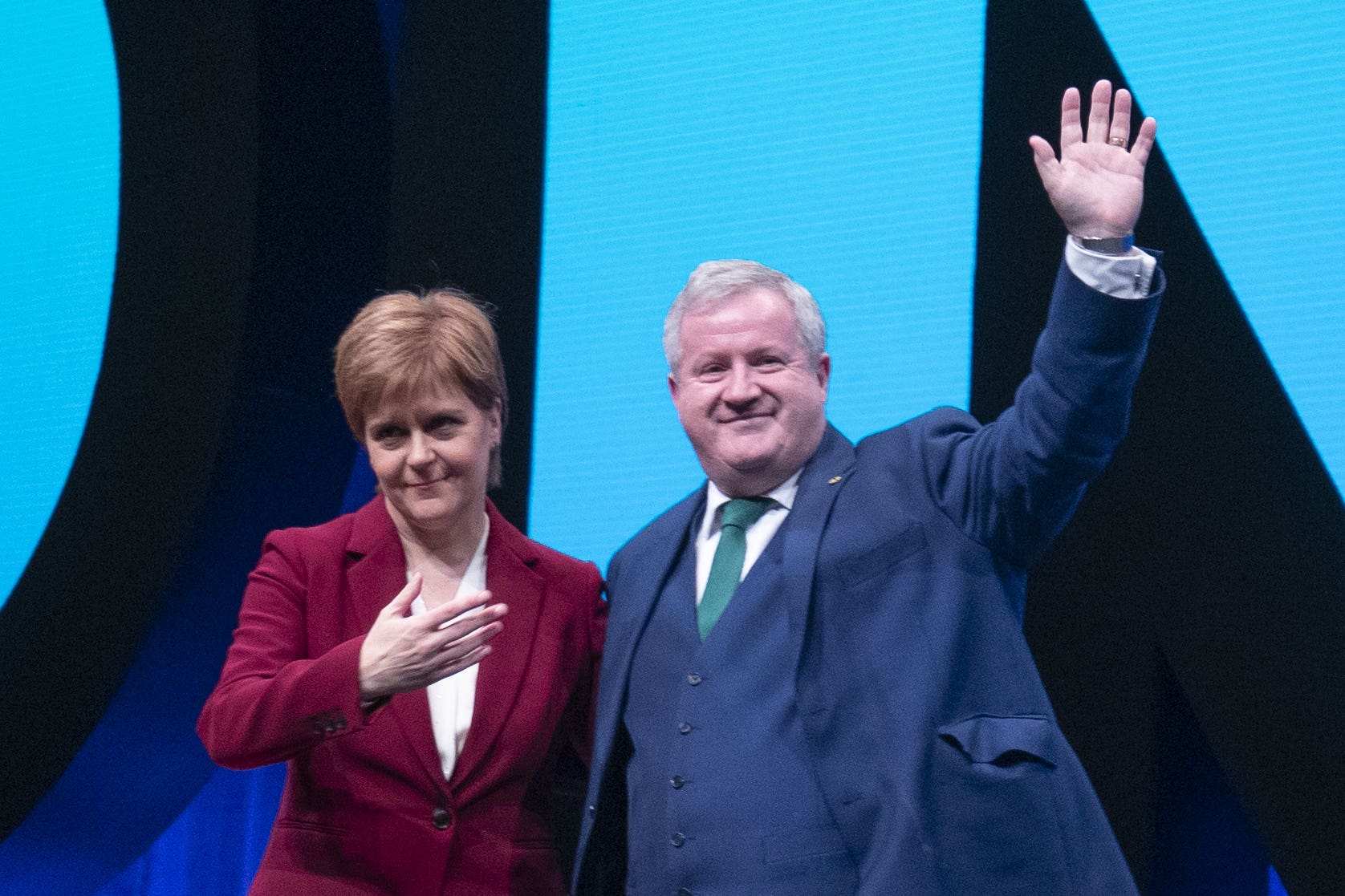 The First Minister paid tribute to her Westminster leader as he announced he would step down (Jane Barlow/PA)