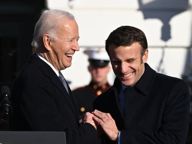<p>US President Joe Biden and French President Emmanuel Macron participate in an arrival ceremony for a State Visit at the White House in Washington, DC, December 1, 2022</p>