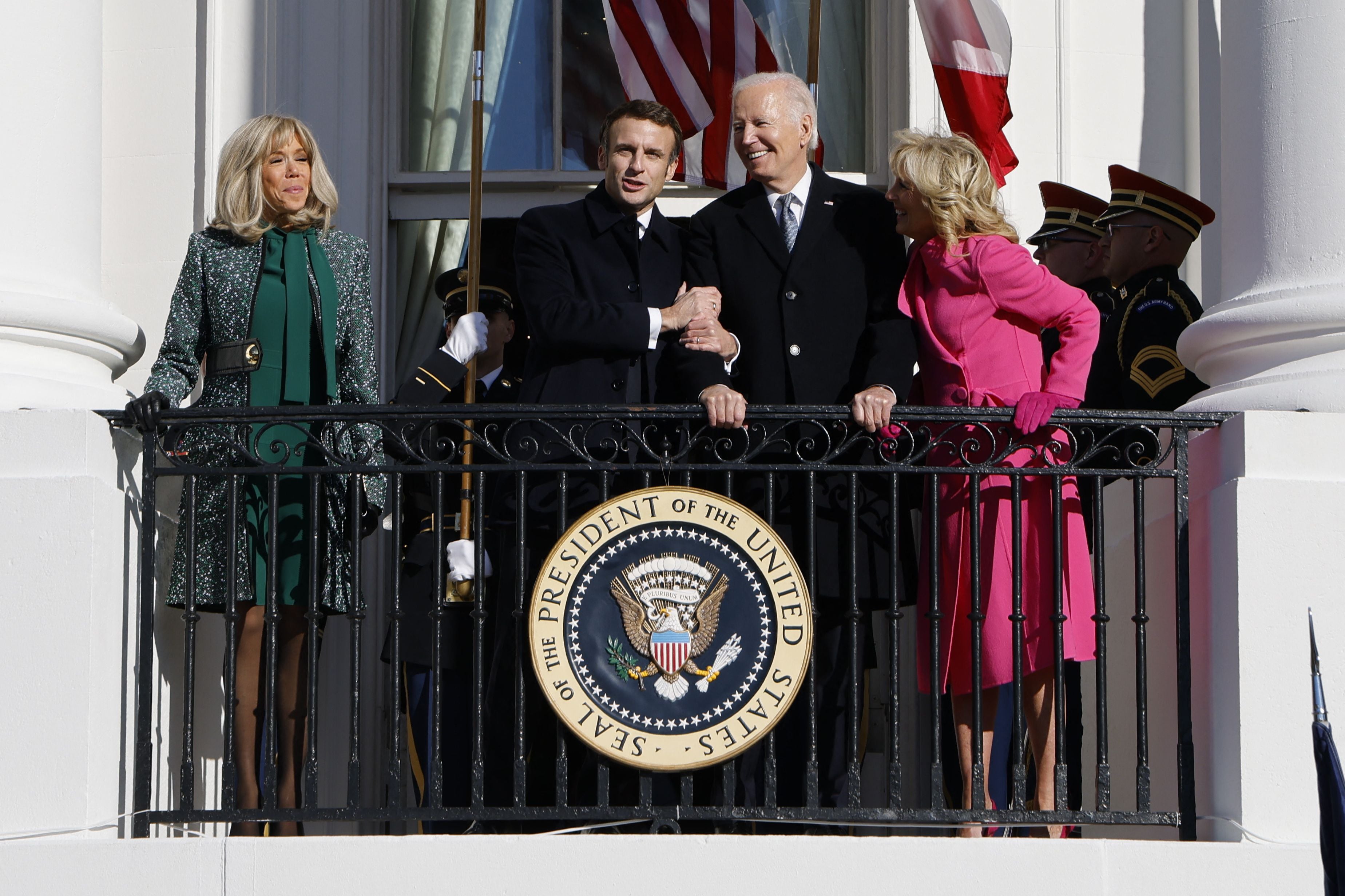 President Joe Biden (center right) and first lady Jill Biden (R) with French President Emmanuel Macron (center left) and his wife Brigitte Macron (L) stand on the Balcony during a State Arrival Ceremony on the South Lawn of the White House in Washington, DC, on December 1, 2022