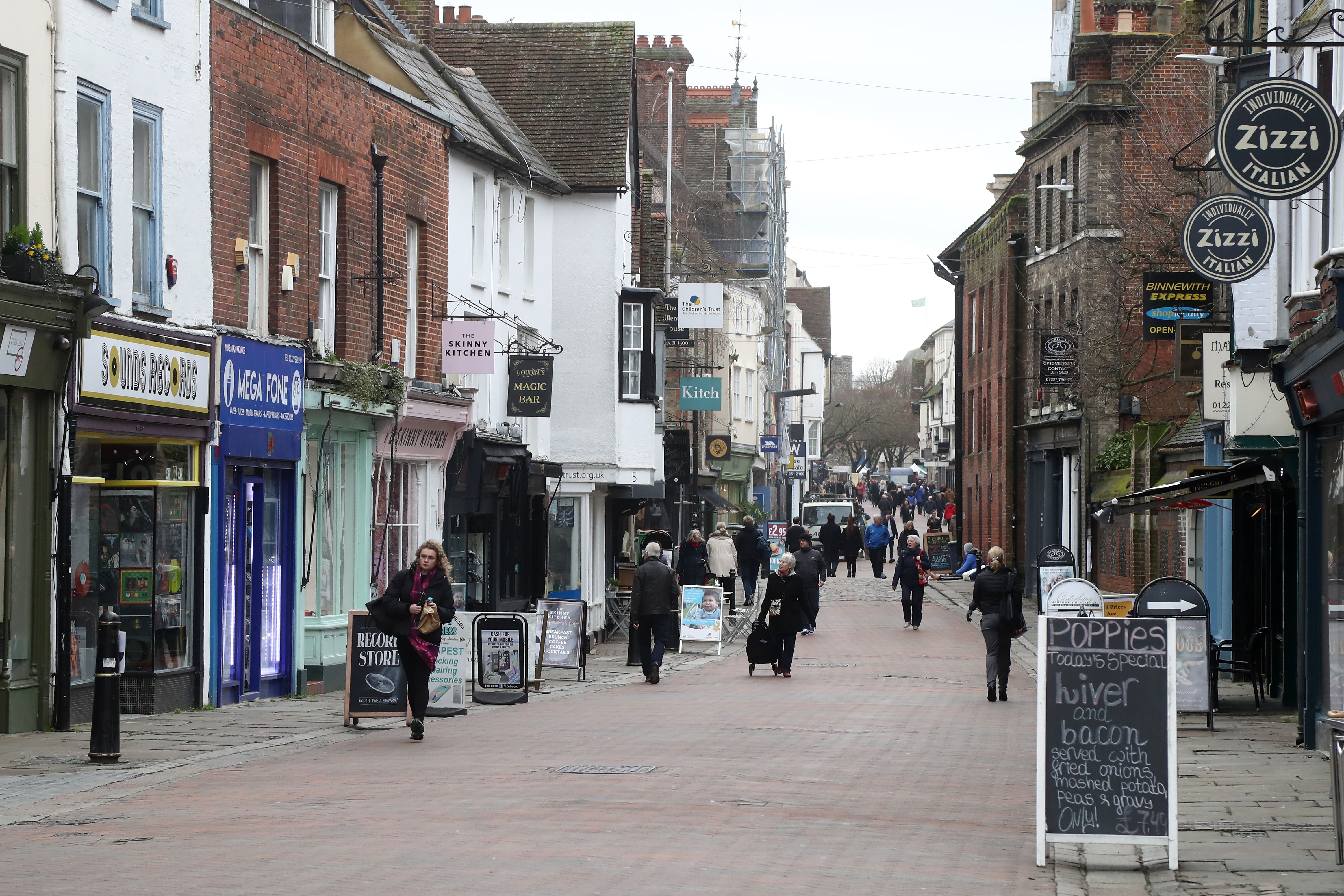 Shopper footfall stumbled again in November as the soaring cost-of-living crisis put consumers off Christmas spending (PA)