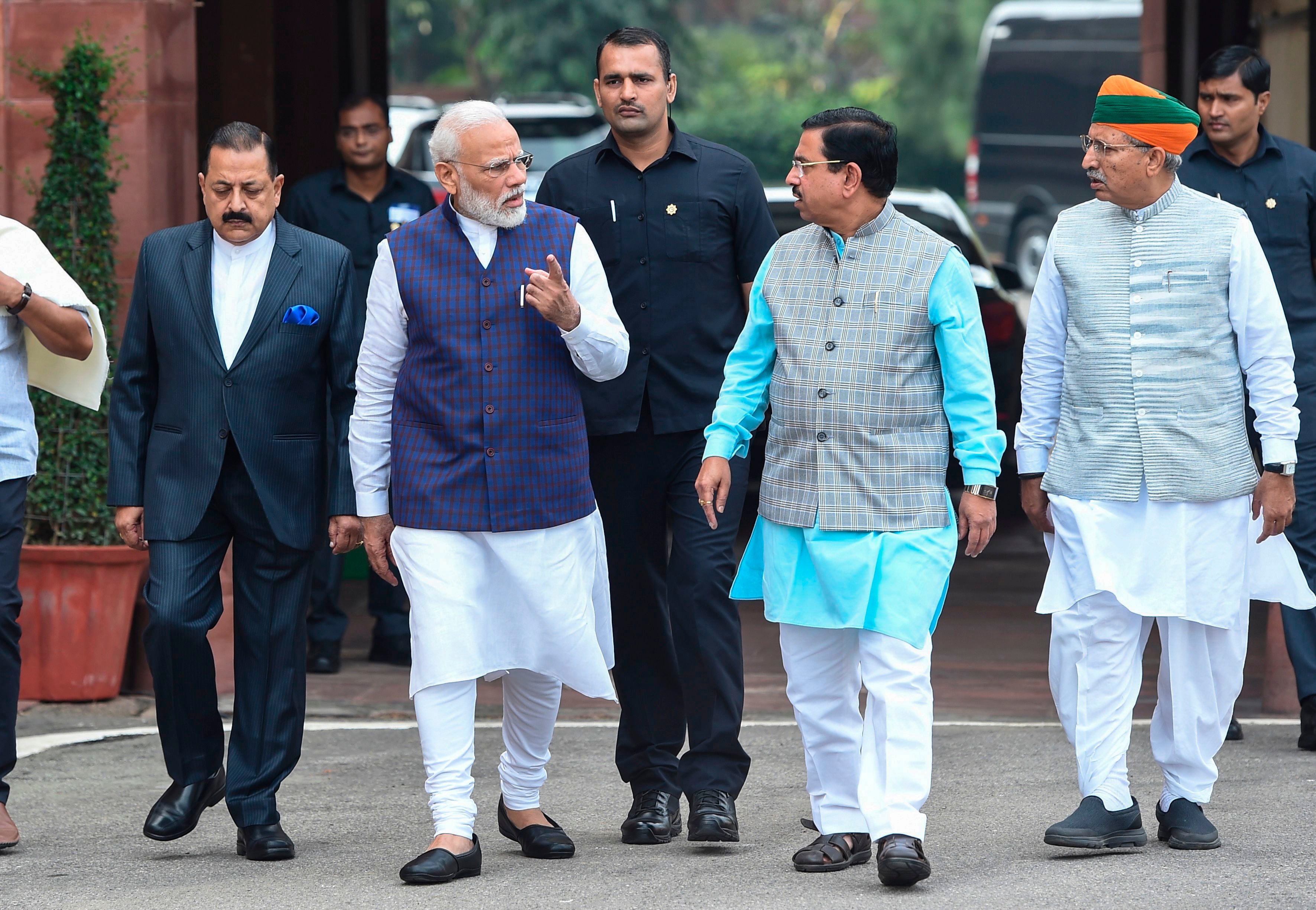 Indian prime minister Narendra Modi, second left, whose government passed the controversial laws