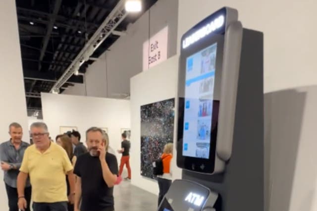 <p>An ATM at Art Basel Miami shows the bank balance of anyone who uses it</p>