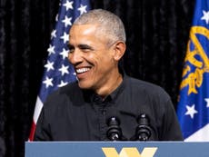 Obama pauses mid-speech to let a four-year-old boy speak at rally for Georgia runoff race