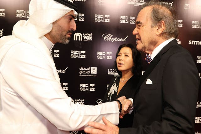 <p>Festival CEO Mohammed al-Turki and US director Oliver Stone</p>