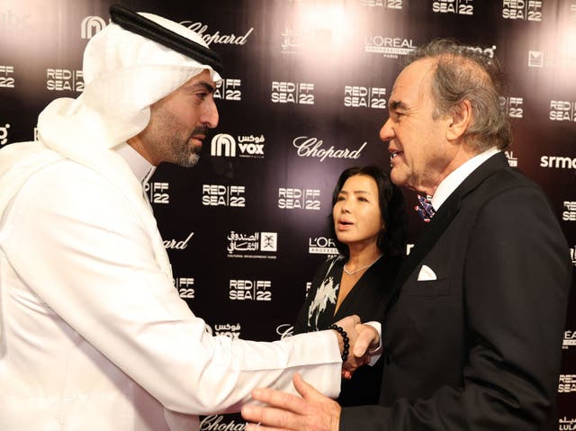 <p>Festival CEO Mohammed al-Turki and US director Oliver Stone</p>