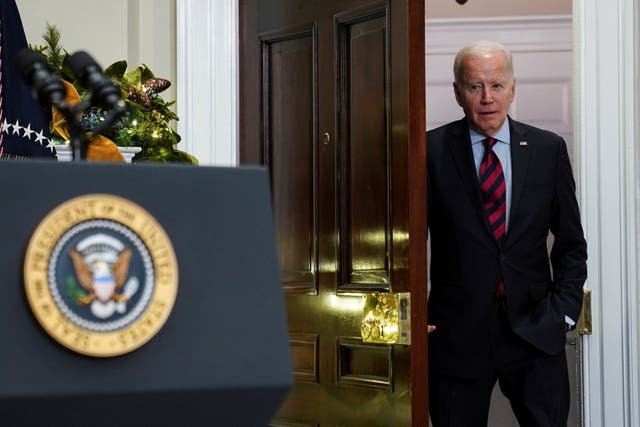 <p>U.S. President Joe Biden arrives prior to signing railroad legislation into law, providing a resoluton to avert a nationwide rail shutdown, during a signing ceremony in the Roosevelt Room at the White House in Washington, U.S., December 2, 2022. REUTERS/Kevin Lamarque</p>