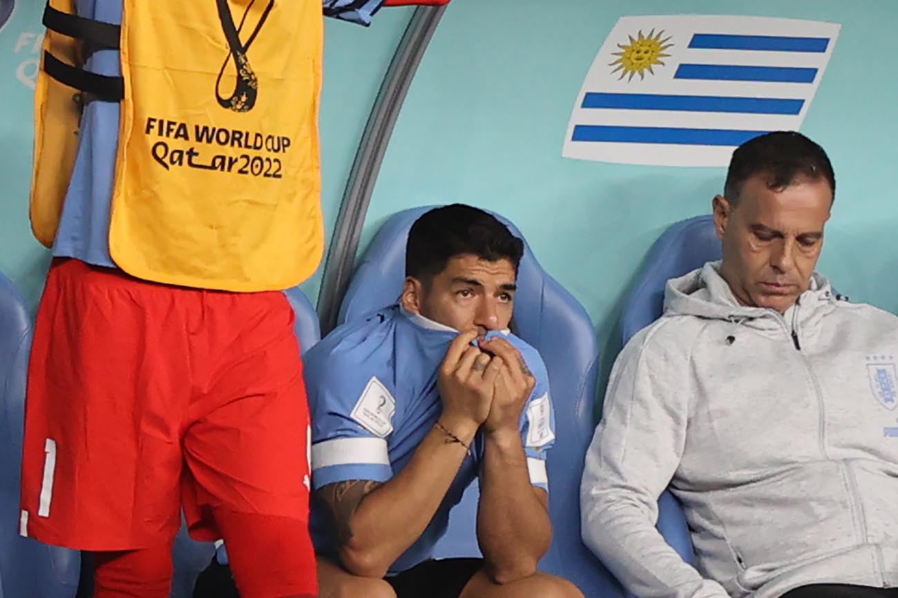 Luis Suarez of Uruguay reacts on the bench