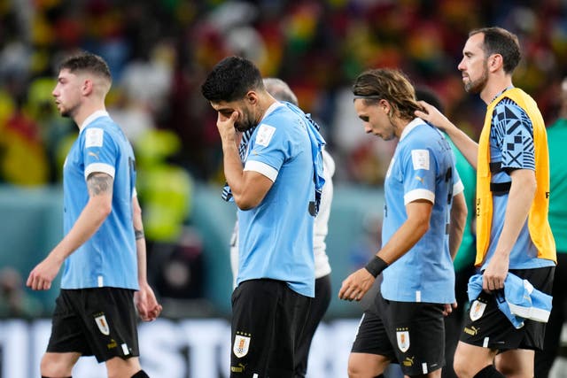 Uruguay’s Luis Suarez , 2nd from left, cries after the World Cup group H soccer match between Ghana and Uruguay, at the Al Janoub Stadium in Al Wakrah, Qatar, Friday, Dec. 2, 2022. (AP Photo/Manu Fernandez)
