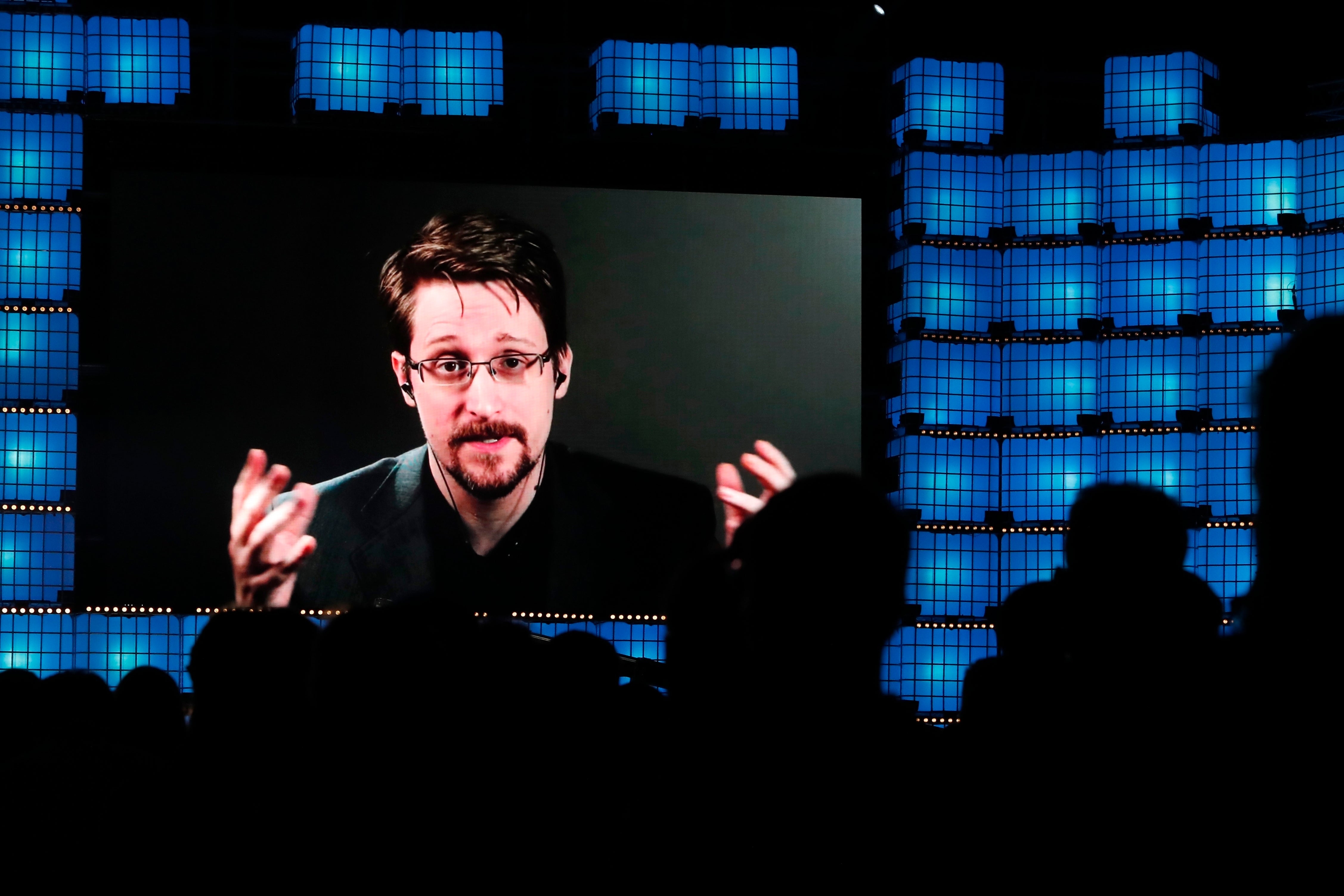 File. Former US National Security Agency contractor Edward Snowden addresses attendees through video link at the Web Summit technology conference in Lisbon on 4 November 2019