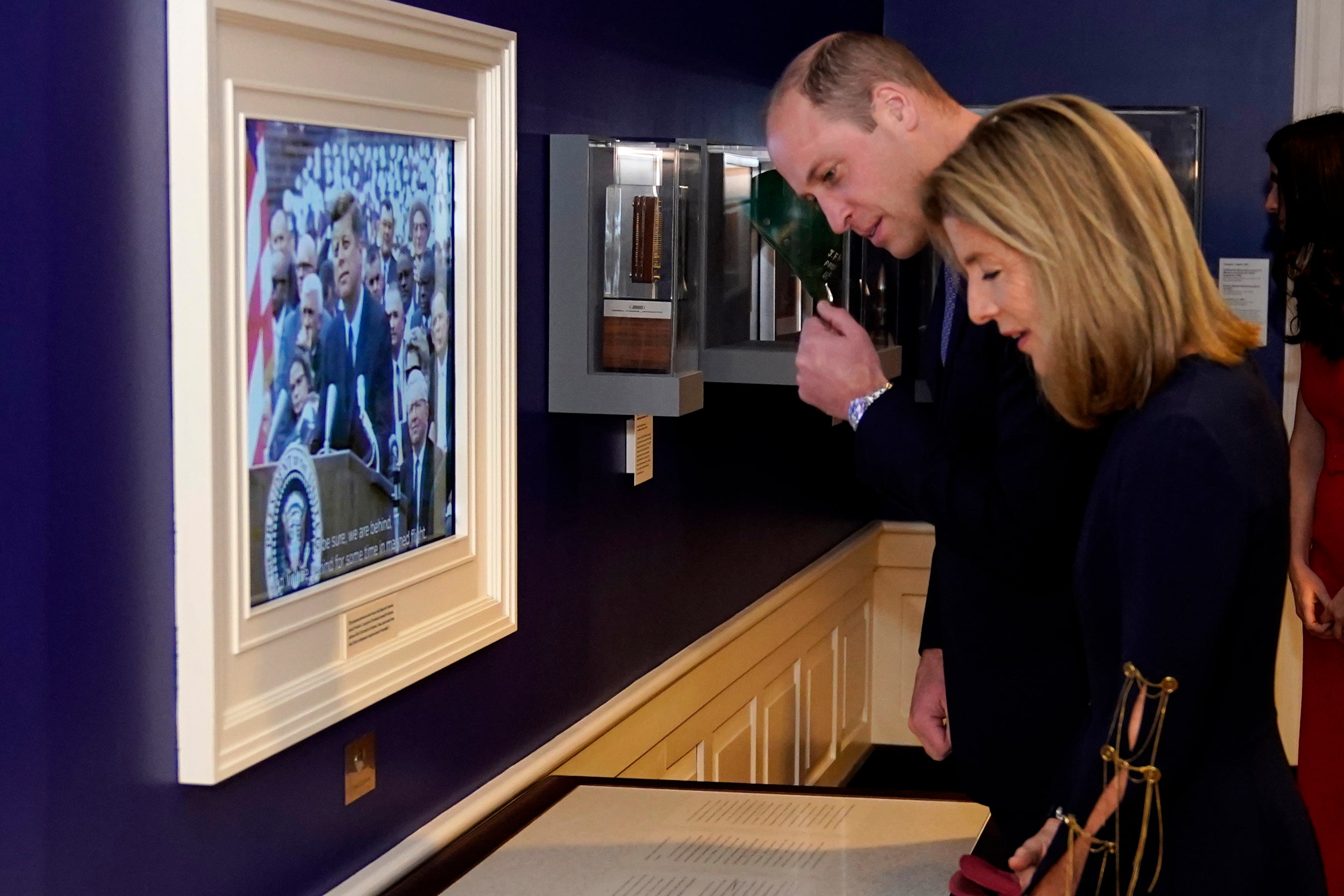 Britain's Prince William (R) and U.S. Ambassador to Australia Caroline Kennedy, daughter of late President Kennedy, tour a space exhibit at the John F. Kennedy Presidential Library in Boston, USA, 02 December 2022