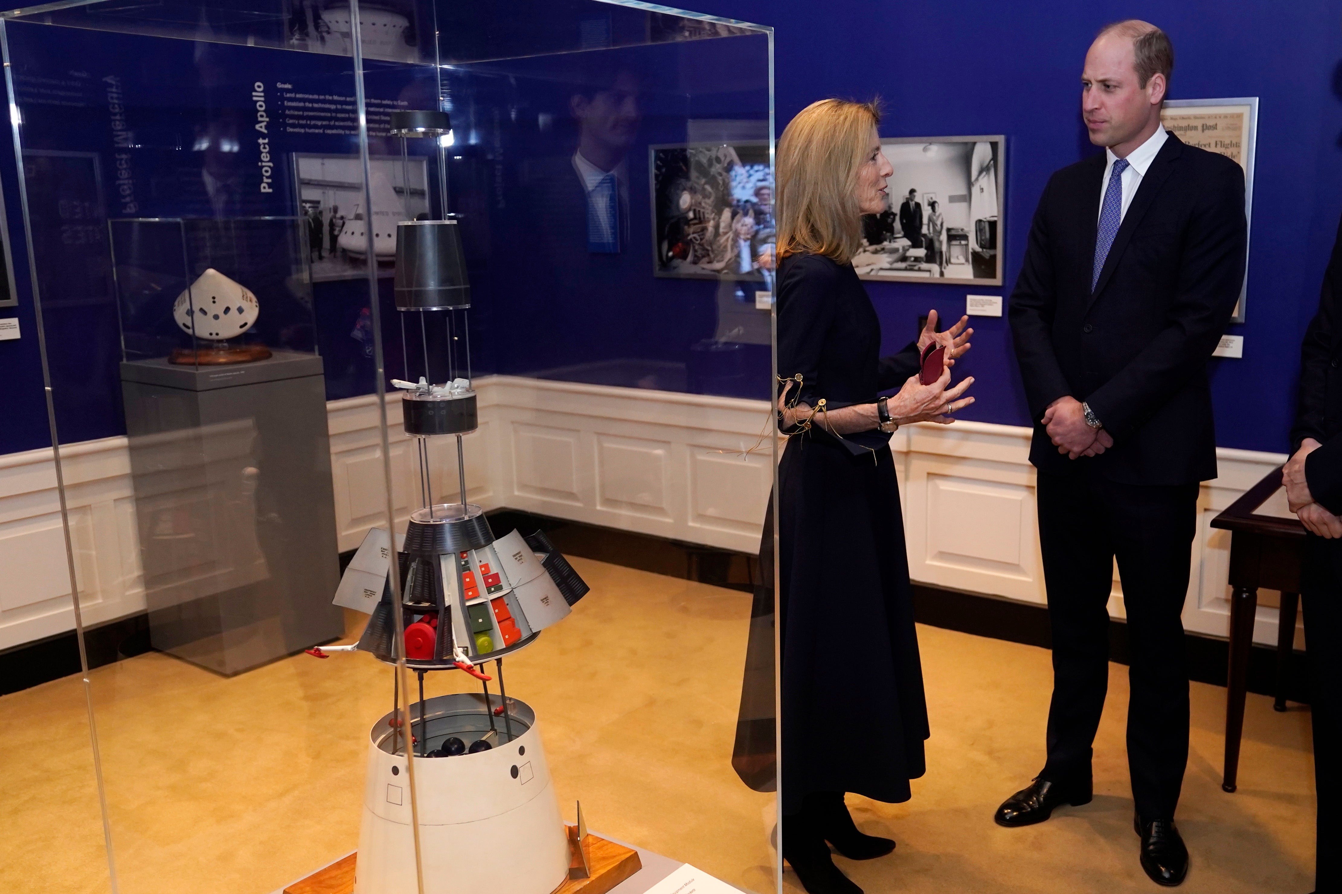 Britain's Prince William (R) and U.S. Ambassador to Australia Caroline Kennedy, daughter of late President Kennedy, tour a space exhibit at the John F. Kennedy Presidential Library in Boston, USA, 02 December 2022