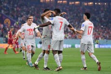 Switzerland into last 16 after edging tempestuous five-goal shootout with Serbia