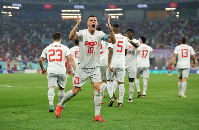 <p>Granit Xhaka of Switzerland celebrates after the third goal by Remo Freuler </p>