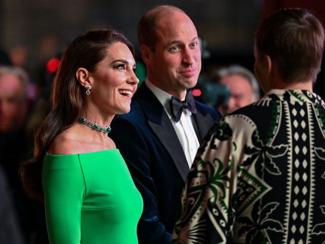 <p>William and Kate talks to guests in Boston on Friday night </p>