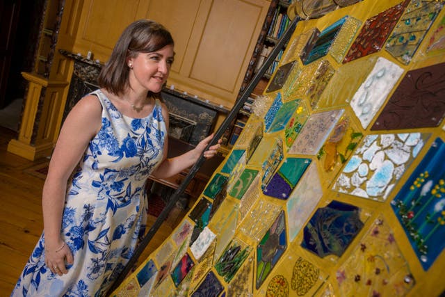 Emma Bourke, glass artist from Westport who contributed to the artwork, A Breath of Fresh Air – The Keep Well Glass Quilt which was launched at Turlough Park House, National Museum of Ireland – Country Life (Michael McLaughlin/PA)