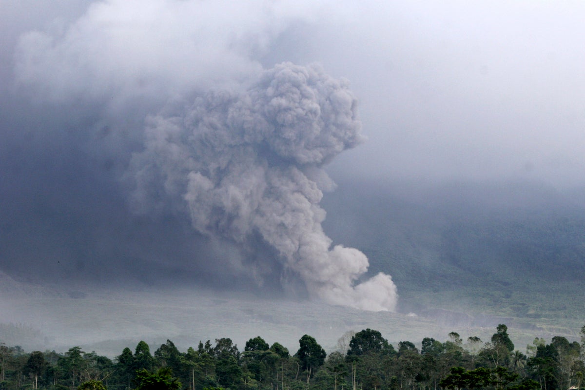 Indonesia’s highest volcano erupts as evacuations begin on most densely populated island