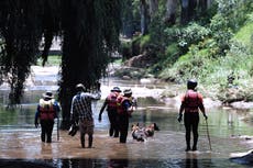 Search for Johannesburg worshippers swept by flood; 14 dead