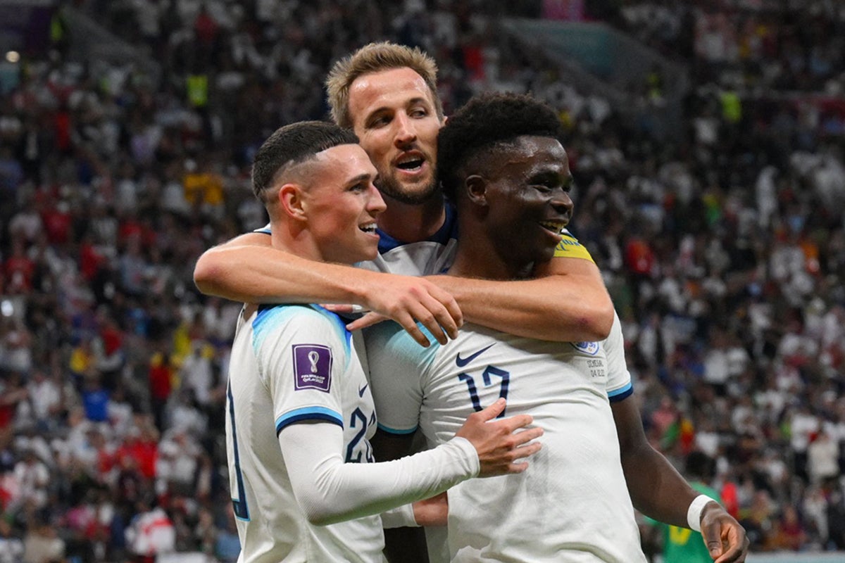 Foden, Kane and Saka celebrate England’s third goal, which was scored by the Arsenal star