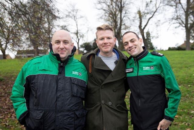 Jonathan Oakeley with St John Ambulance volunteers Dave Jackson (left) and Paul Robertson (right) (Collect/PA Real Life)