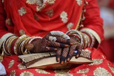 Indian groom facing charges after marrying twin sisters in polygamous wedding ceremony