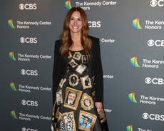 Julia Roberts wears Moschino gown covered in photos of George Clooney 