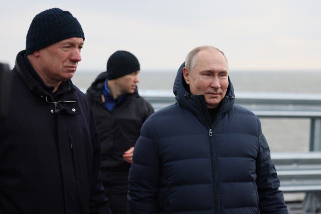 <p>Mr Putin also walked along the bridge to inspect the damage </p>