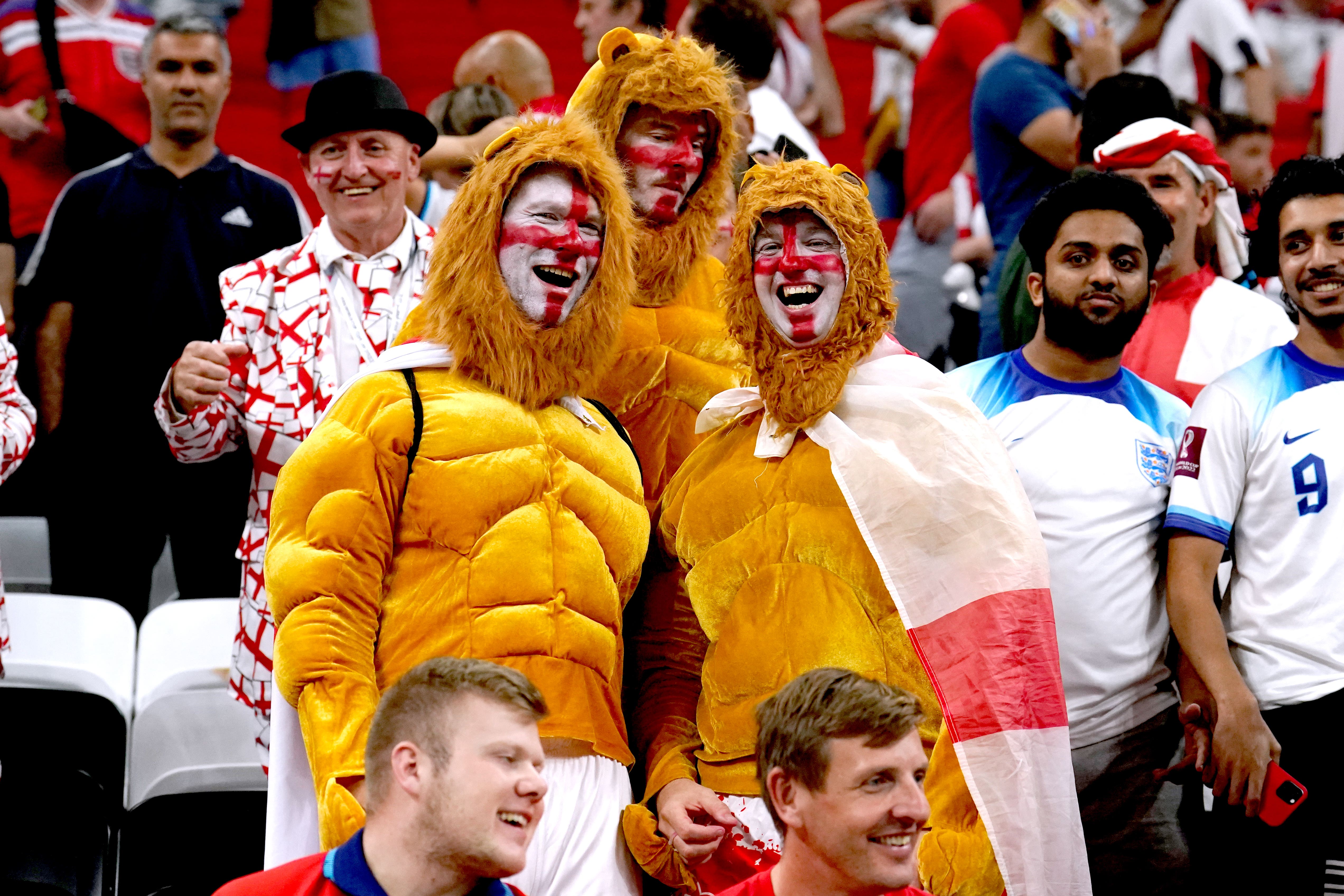 England fans dressed as three lions in the stands at the end of the FIFA World Cup Round of Sixteen match at the Al-Bayt Stadium in Al Khor, Qatar. Picture date: Sunday December 4, 2022 (Martin Rickett/PA)