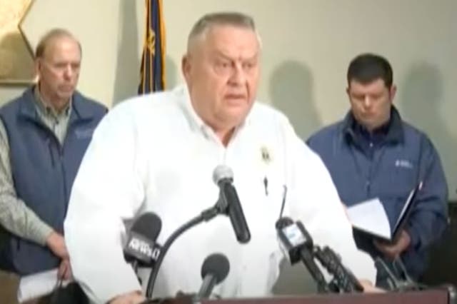 <p>Moore County Sheriff Ron Fields shares information with reporters after an ‘intentional’ attack on power substations leaves more than 33,000 customers without power in the region</p>
