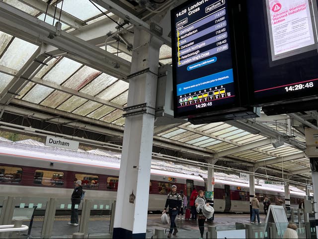 <p>Warning sign: Durham railway station screens announce next strikes</p>