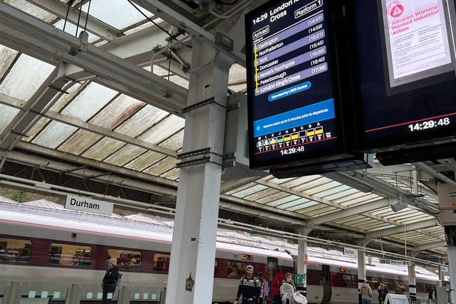 <p>Warning sign: Durham railway station screens announce next strikes</p>