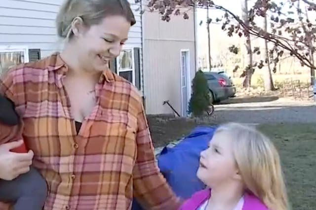 <p>Five-year-old Rylee MacNamara (pictured right with her mother) was attacked by a raccoon on her front porch</p>