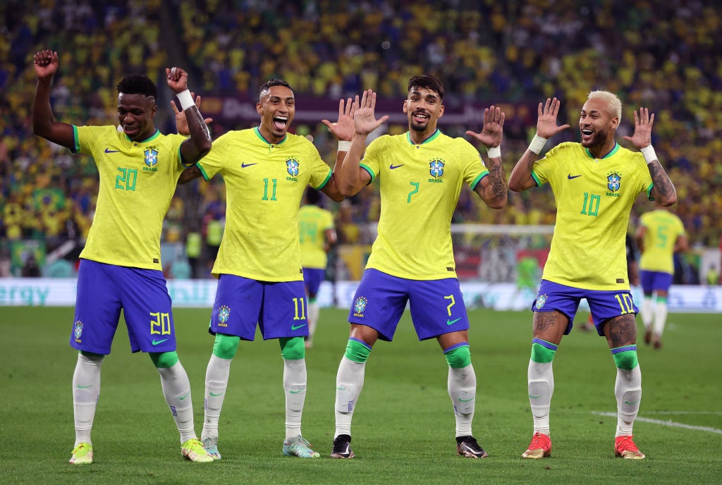 Neymar, right, celebrates with his teammates