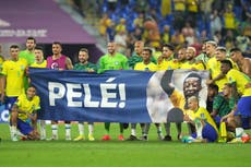 Brazil players display banner in support of Pele after seeing off South Korea