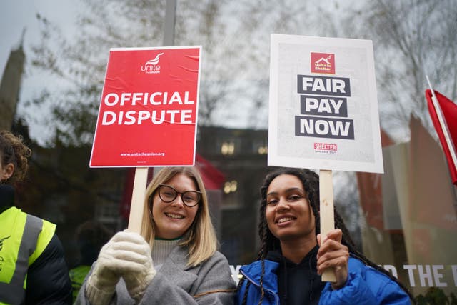 Members of the Unite union who work for housing and homeless charity Shelter on the picket line outside their offices in Old Street, London (Yui Mok/PA)