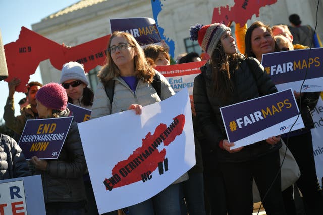 <p>A protest in front of the US Supreme Court in 2019 demanded an end to partisan gerrymandering, the drawing of political boundaties for elections that benefit one party. A new case in front of the justices could open the door for state lawmakers to increased gerrymandering. </p>