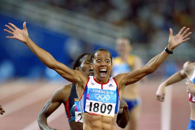 Kelly Holmes celebrates winning the 800m at the 2004 Olympics (David Davies/PA)