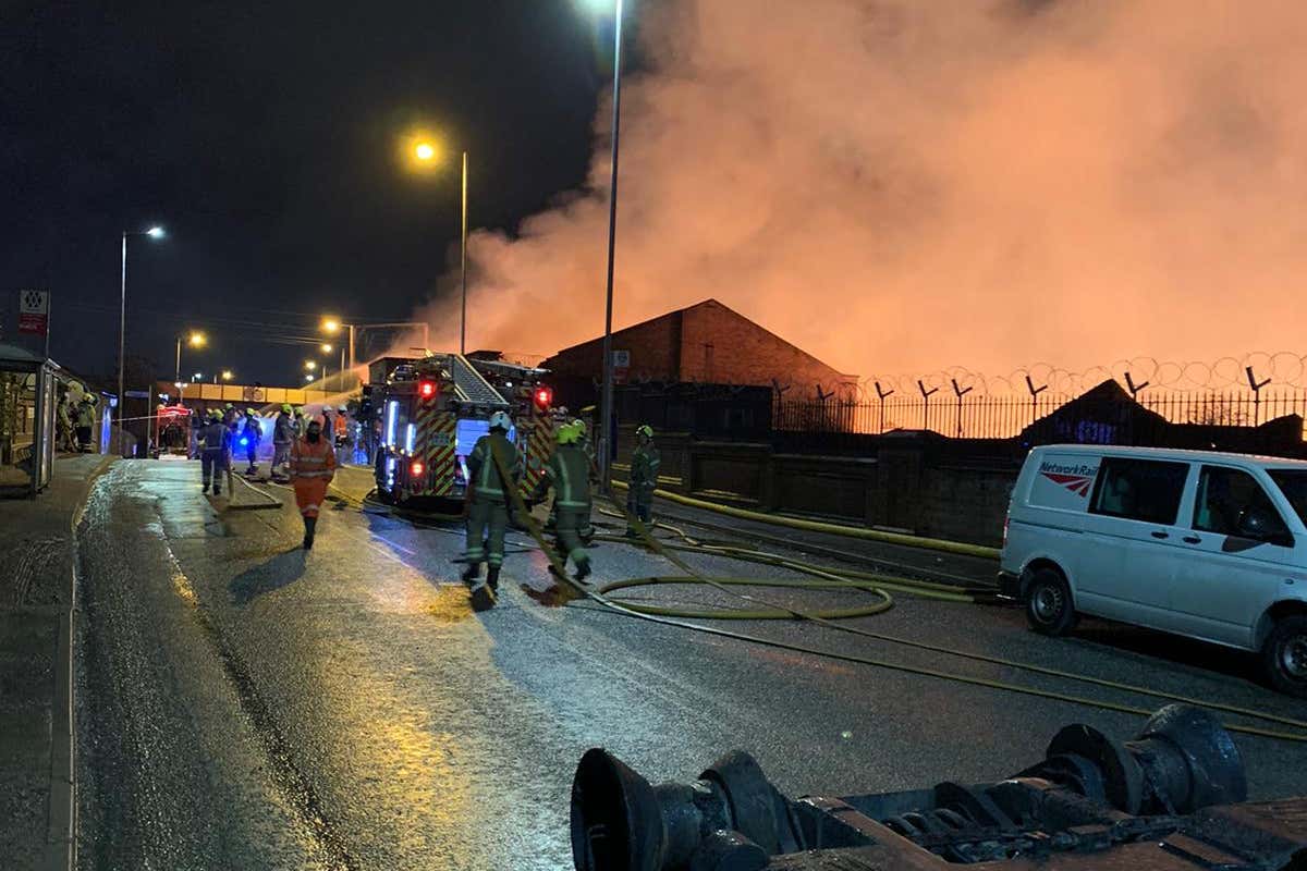 Major incident declared as 100 firefighters tackle blaze in derelict ...