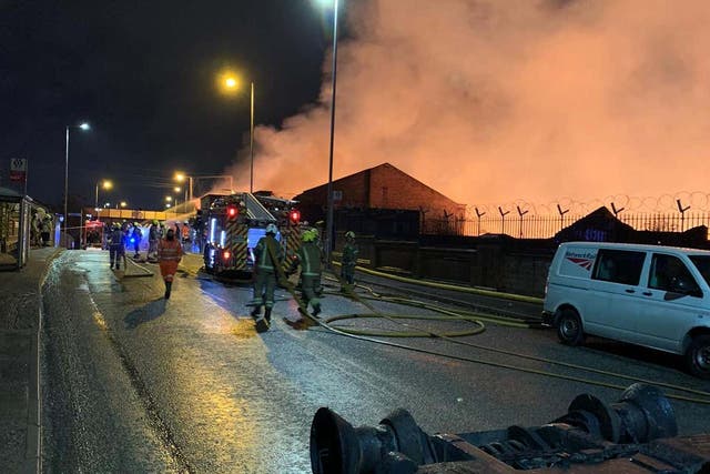 A major incident has been declared, with more than 100 firefighters tackling a huge overnight blaze which has torn through several derelict factories in Wolverhampton (West Midlands Fire Service/PA)