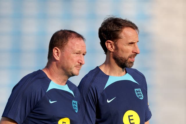 <p>England manager Gareth Southgate (right) with assistant coach Steve Holland</p>