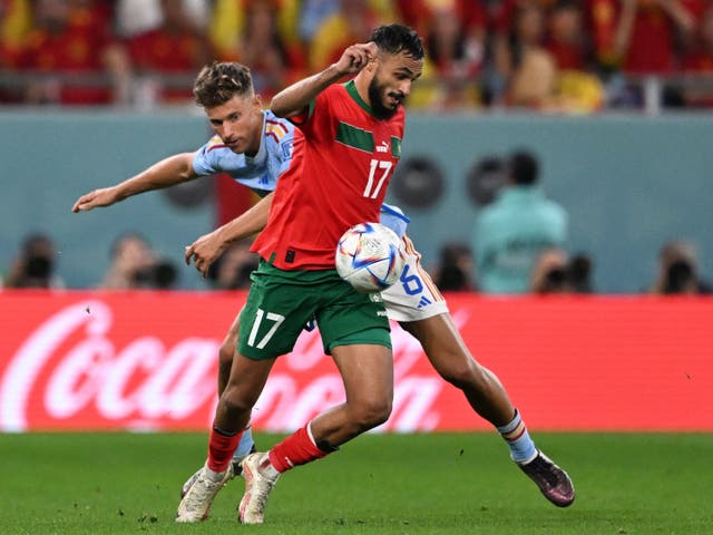 <p>Sofiane Boufal on the ball for Morocco against Spain</p>