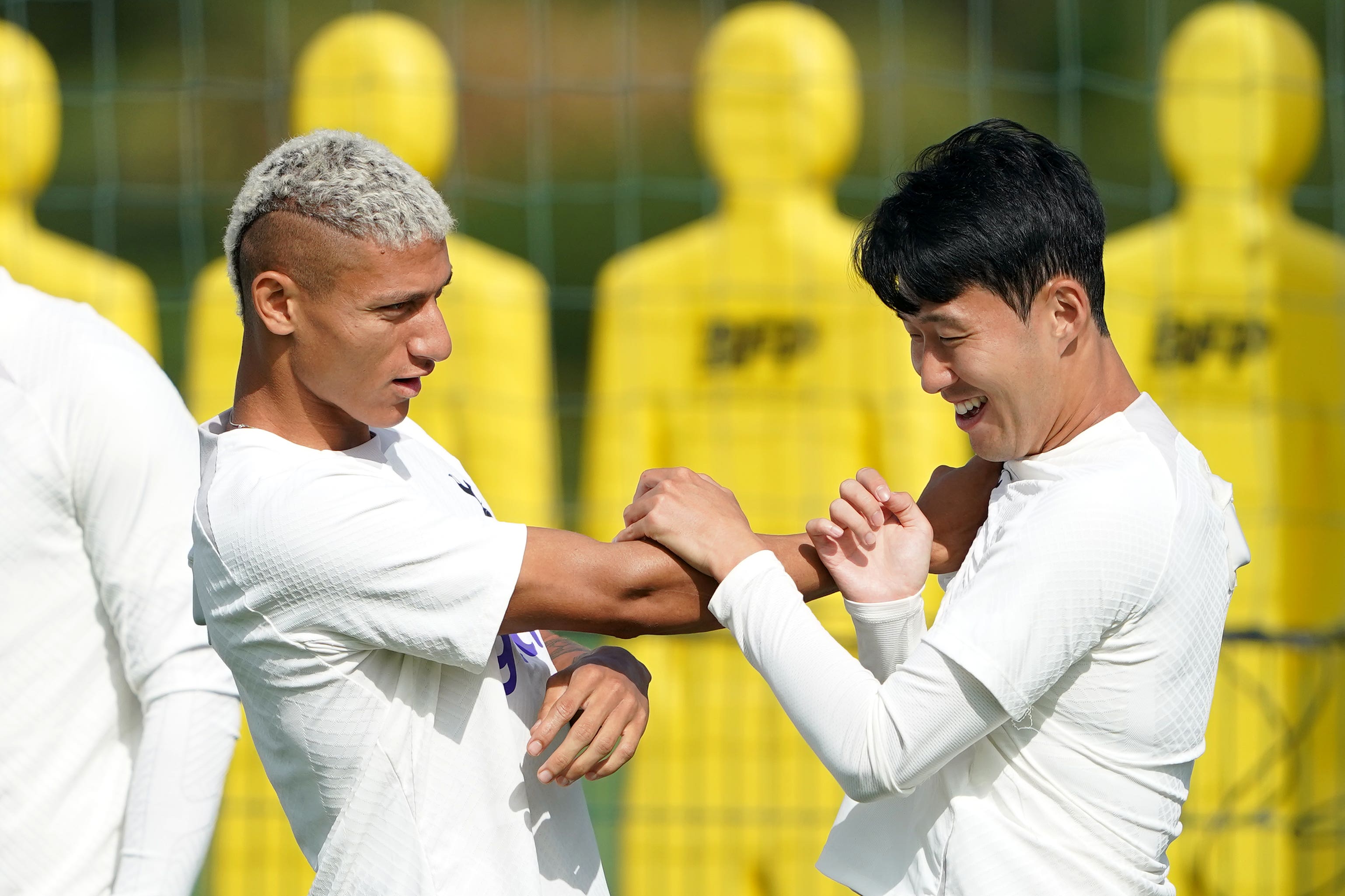 Tottenham’s Richarlison, left, and Son Heung-min during a training session (Zac Goodwin/PA)
