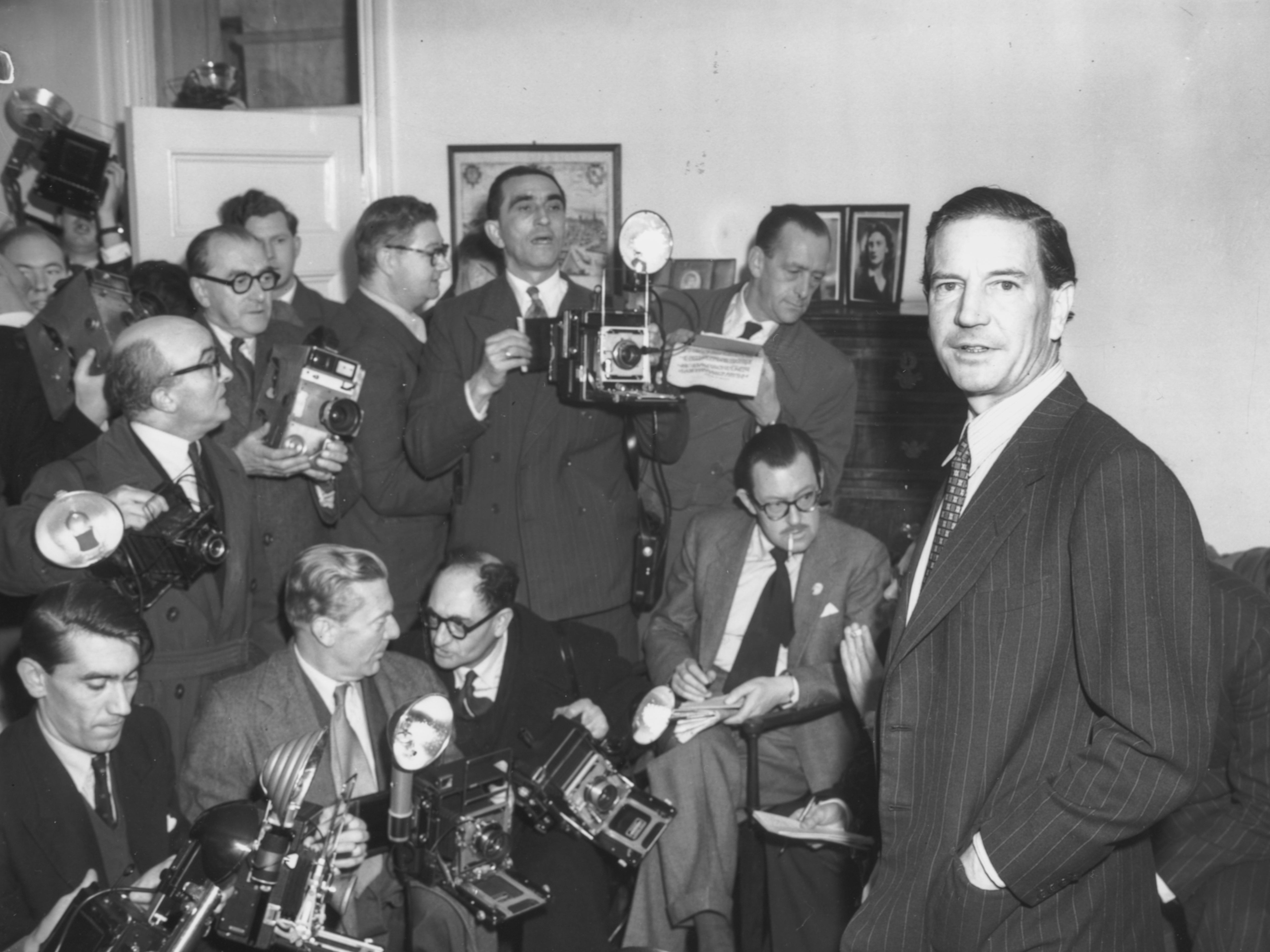 Philby (right) at a London press conference held in response to his involvement with Burgess and McLean, 8 November 1955