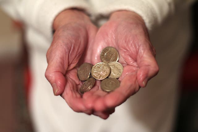 Pensioners on low incomes are being urged by Age UK to see if they qualify for Pension Credit, which could help them to access other cost-of-living support as well as topping up their regular income (Yui Mok/PA)
