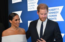 ‘Loving’ Prince Harry commended for protecting Meghan under umbrella at New York award ceremony