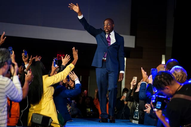 <p>Raphael Warnock at an election party </p>