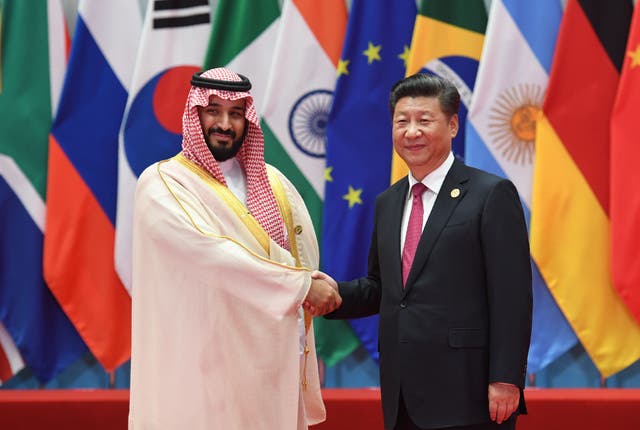 <p>Saudi Arabia Crown Prince Mohammed bin Salman Al Saud shakes hands with China’s President Xi Jinping before the G20 leaders’ family photo in Hangzhou in 2016 </p>