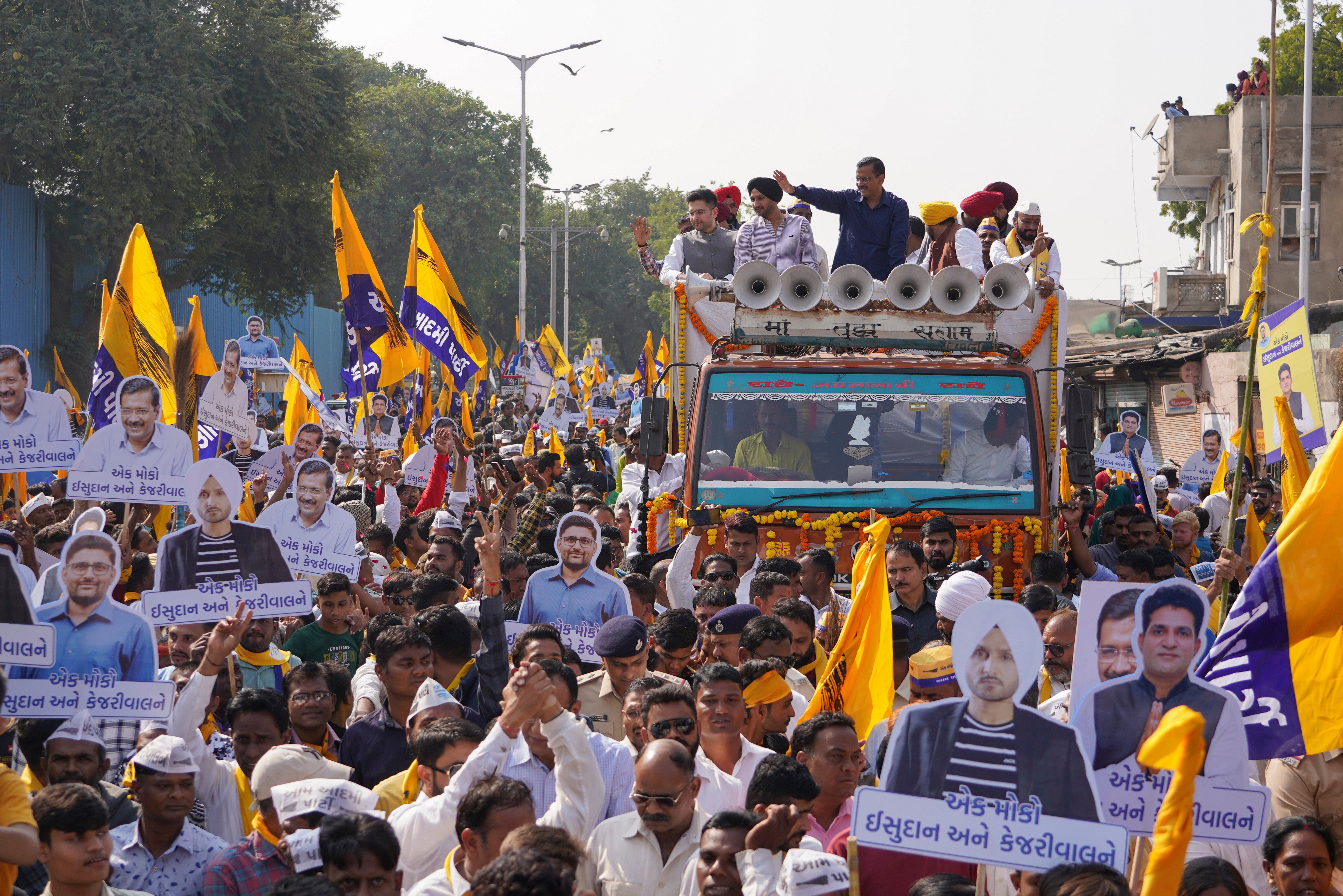 File. Aam Aadmi Party leader Arvind Kejriwal, waves from a truck as he campaigns for the Gujarat state elections in Ahmedabad, India, Thursday, 1 December 2022